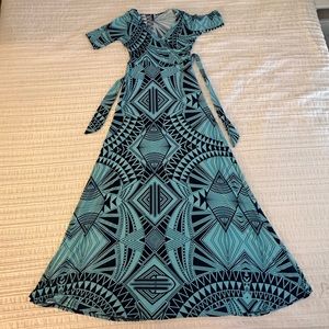Plus sized, teal short sleeved, belted maxi dress. Southwest pattern. Size 14.